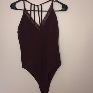 Low cut v onesie